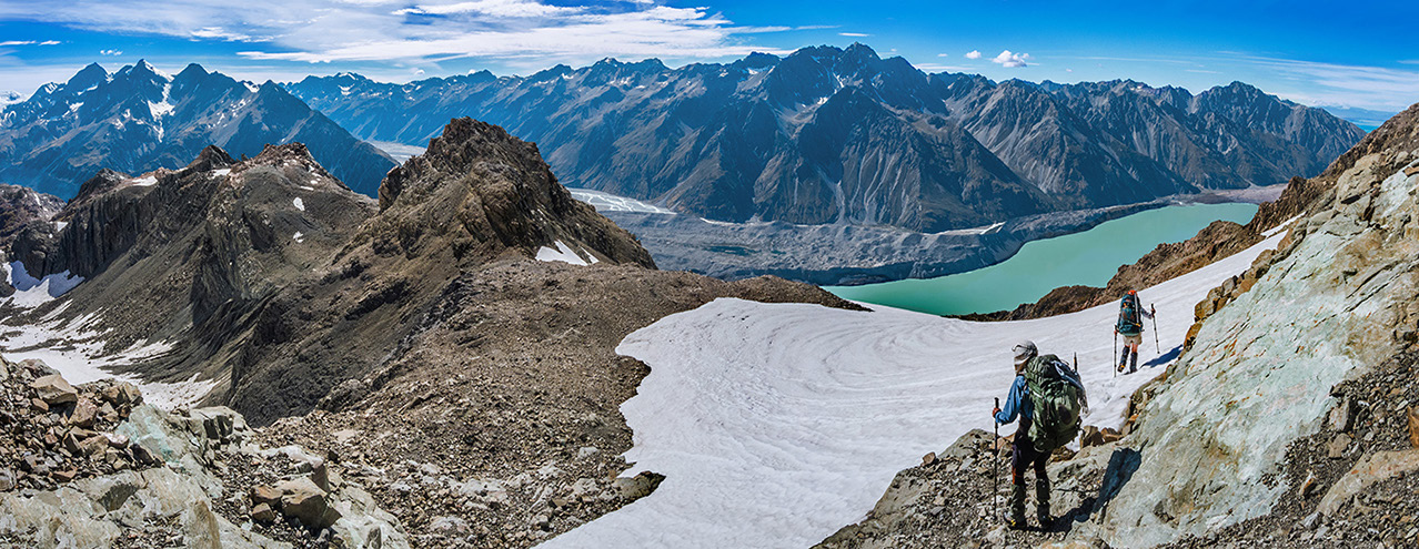 Approaching the east Hooker Valley camping flats (right), with the steep snow chute leading to the Playing Field above